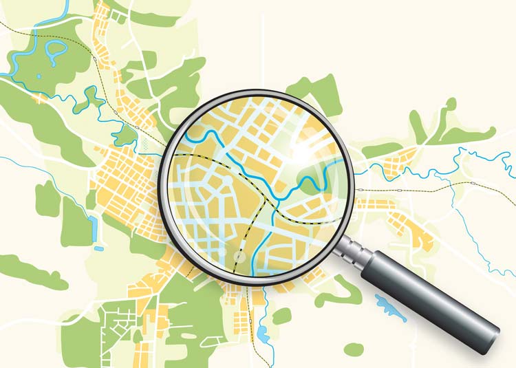 Grafik Lupe liegt auf Stadtplan © Foto Flare - Fotolia.com Grafik Lupe liegt auf Stadtplan